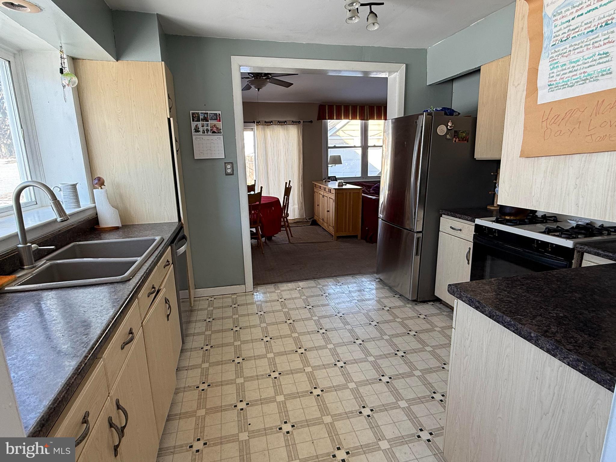 530 Kenmore Road Havertown, PA 19083 - Photo 7 of 25 a kitchen with stainless steel appliances granite countertop a refrigerator a stove and a sink