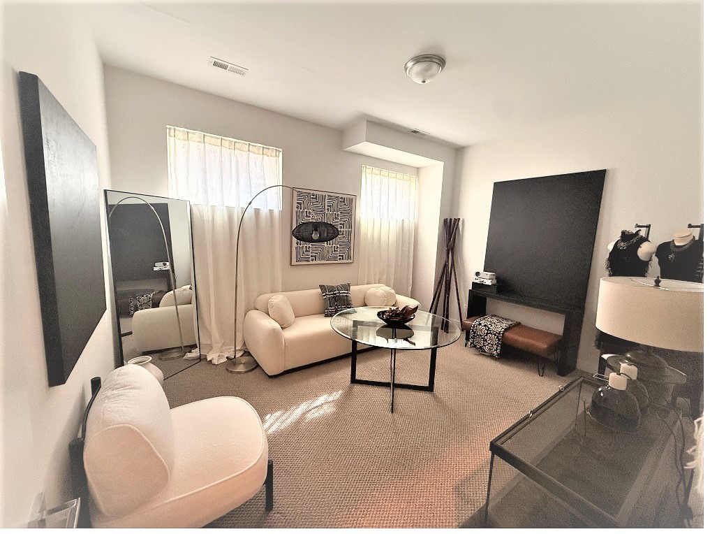 2835 West Division Street, Unit 1W Chicago, IL 60622 - Photo 25 of 39 a living room with furniture and a flat screen tv