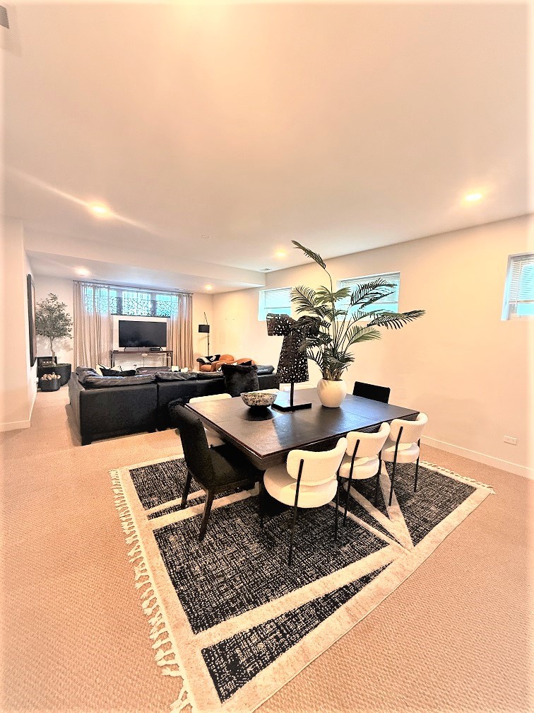 2835 West Division Street, Unit 1W Chicago, IL 60622 - Photo 29 of 39 a view of a dining room with furniture and a rug