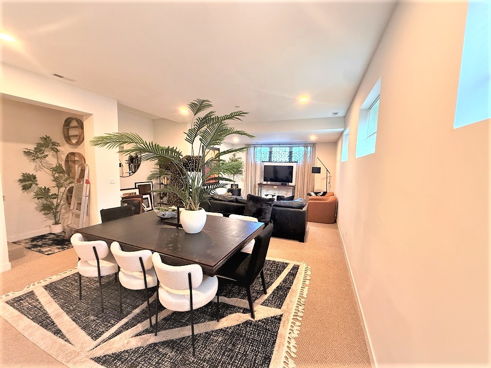 2835 West Division Street, Unit 1W Chicago, IL 60622 - Photo 30 of 39 a view of a dining room with furniture and wooden floor