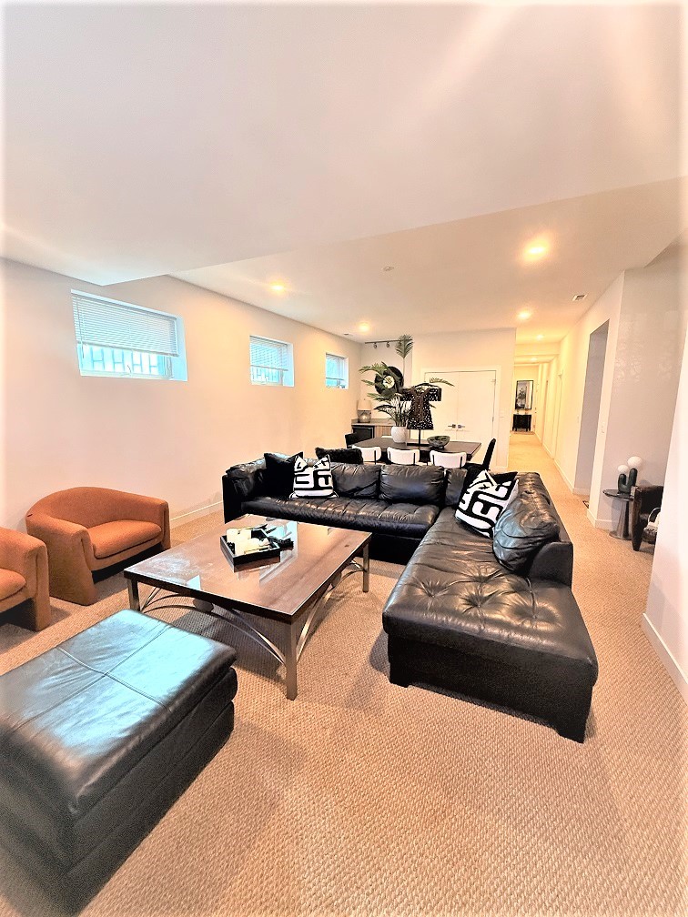 2835 West Division Street, Unit 1W Chicago, IL 60622 - Photo 32 of 39 a living room with furniture and a table