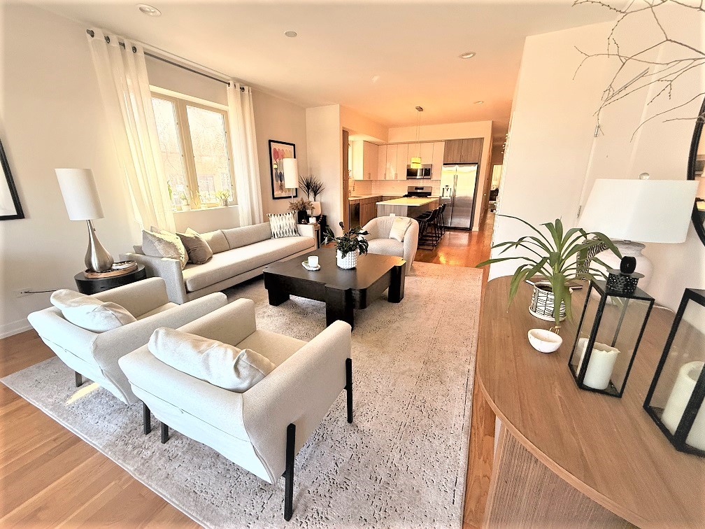 2835 West Division Street, Unit 1W Chicago, IL 60622 - Photo 6 of 39 a living room with furniture and a large window