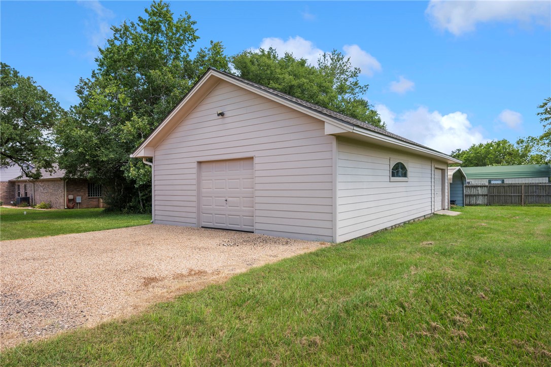 4960 Drake Drive College Station, TX 77845 - Photo 30 of 31 a view of a backyard with a garden