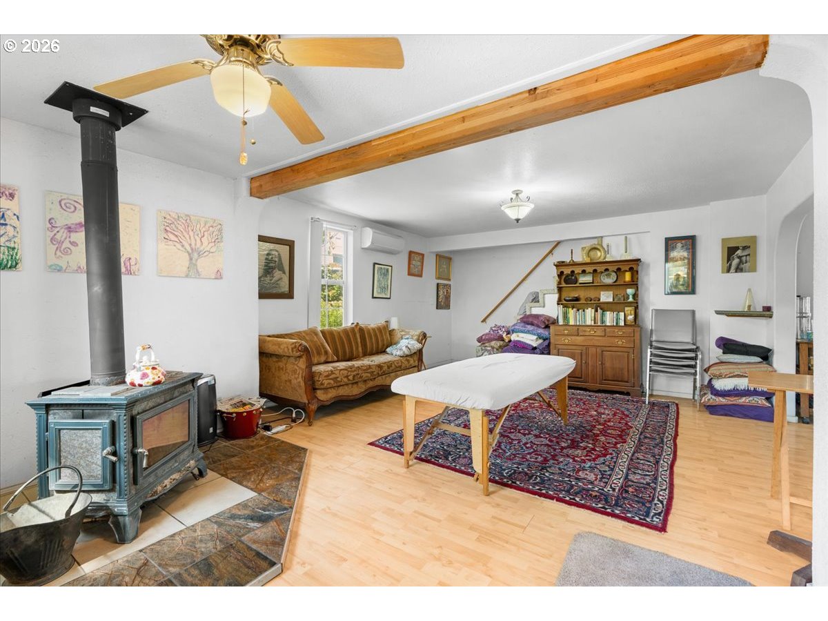 772 Division Street Oregon City, OR 97045 - Photo 10 of 47 a living room with furniture a rug and a table