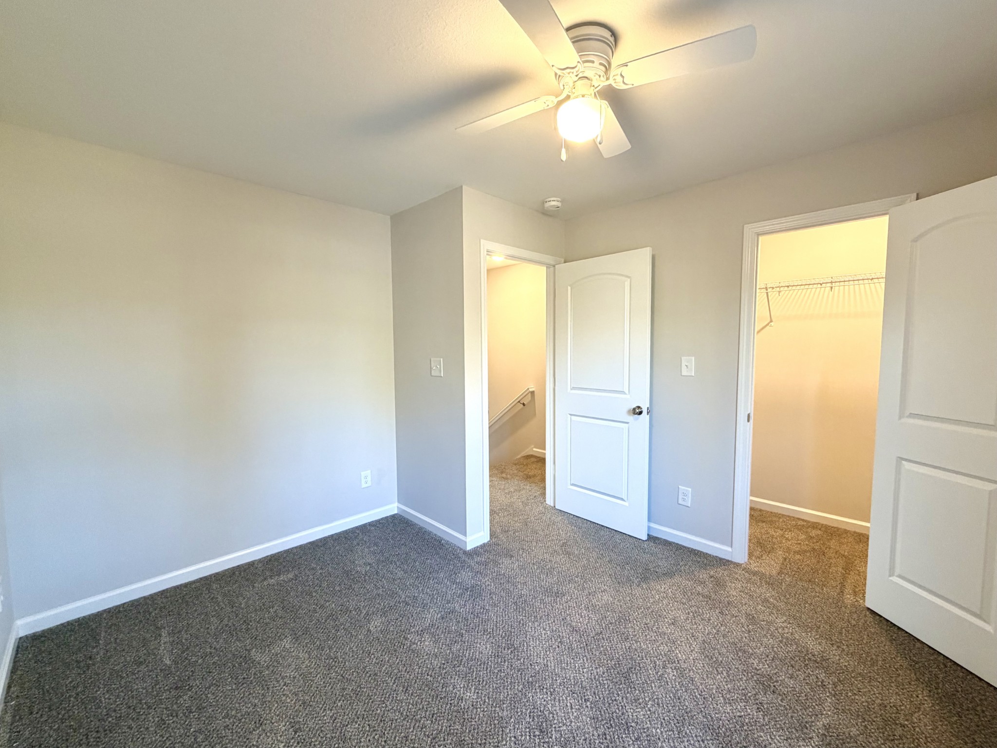 509 Britton Springs Road, Unit B4 Clarksville, TN 37042 - Photo 17 of 20 an empty room with a ceiling fan and a window