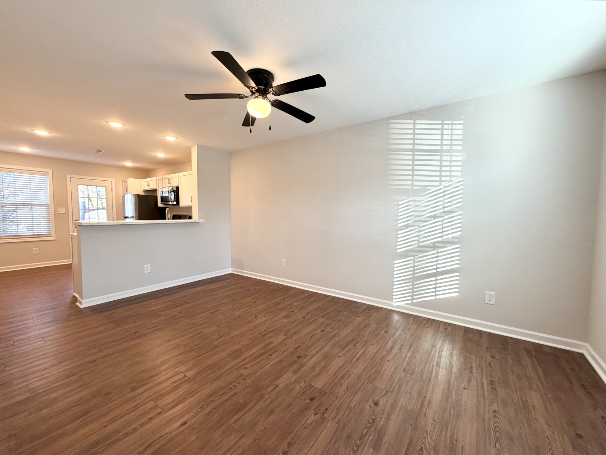 509 Britton Springs Road, Unit B4 Clarksville, TN 37042 - Photo 2 of 20 a view of a room with wooden floor and windows