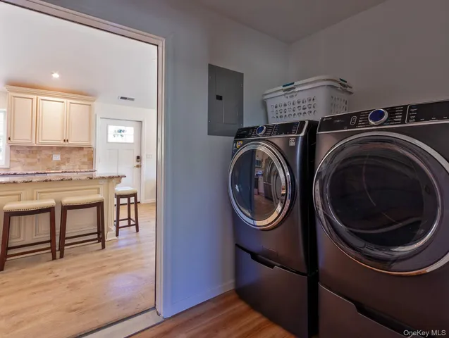 a bedroom with a bed and a table