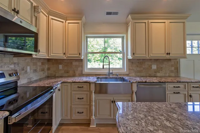 a view of an chairs and tables in the patio