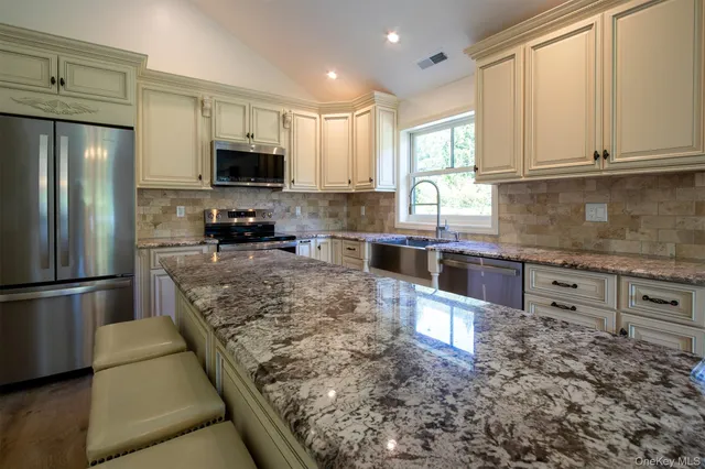 a view of a tree with a yard