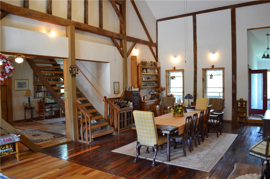 274 Gressly Road Ruffs Dale, PA 15679 - Photo 12 of 49 a view of a dining room with lots of furniture and wooden floor