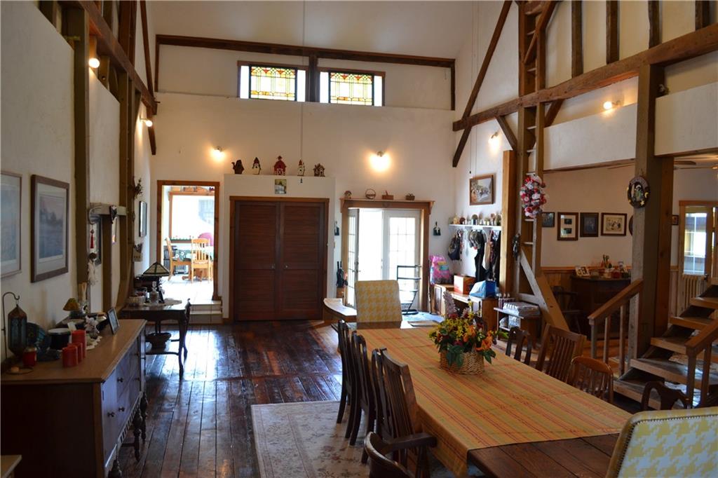 274 Gressly Road Ruffs Dale, PA 15679 - Photo 13 of 49 a view of a dining room with furniture and wooden floor