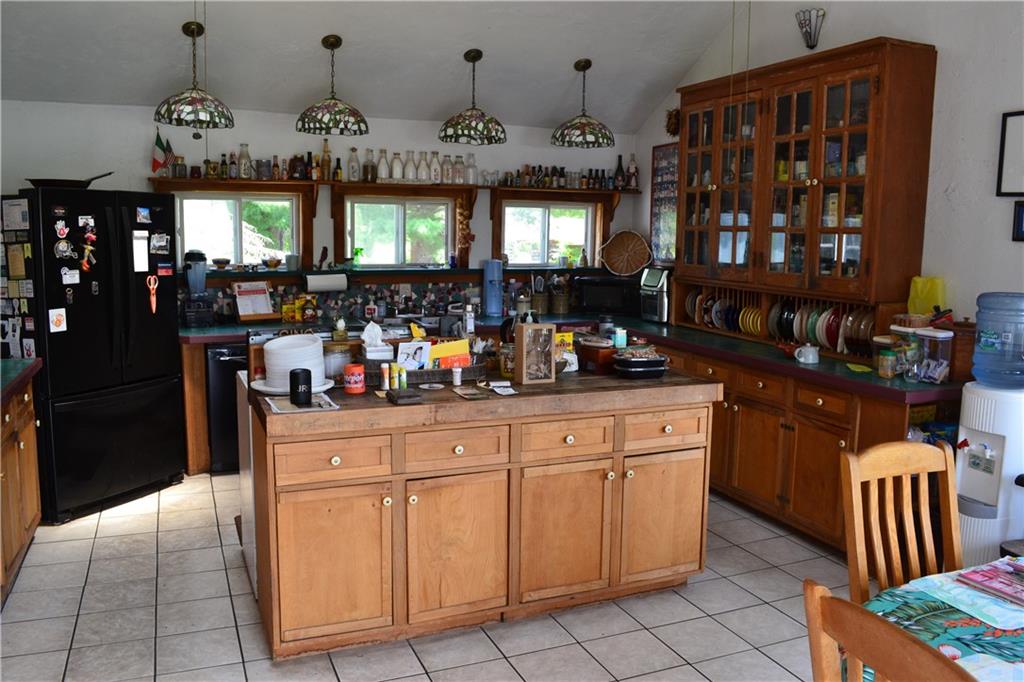 274 Gressly Road Ruffs Dale, PA 15679 - Photo 14 of 49 a kitchen with stainless steel appliances granite countertop a sink and cabinets