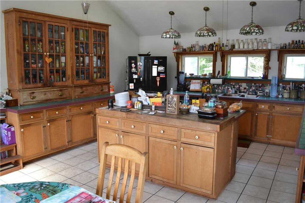 274 Gressly Road Ruffs Dale, PA 15679 - Photo 15 of 49 a kitchen with a sink cabinets and window