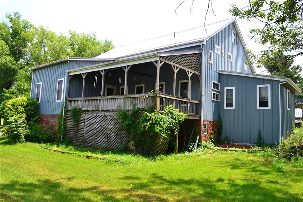 274 Gressly Road Ruffs Dale, PA 15679 - Photo 2 of 49 a view of a house with a yard and plants