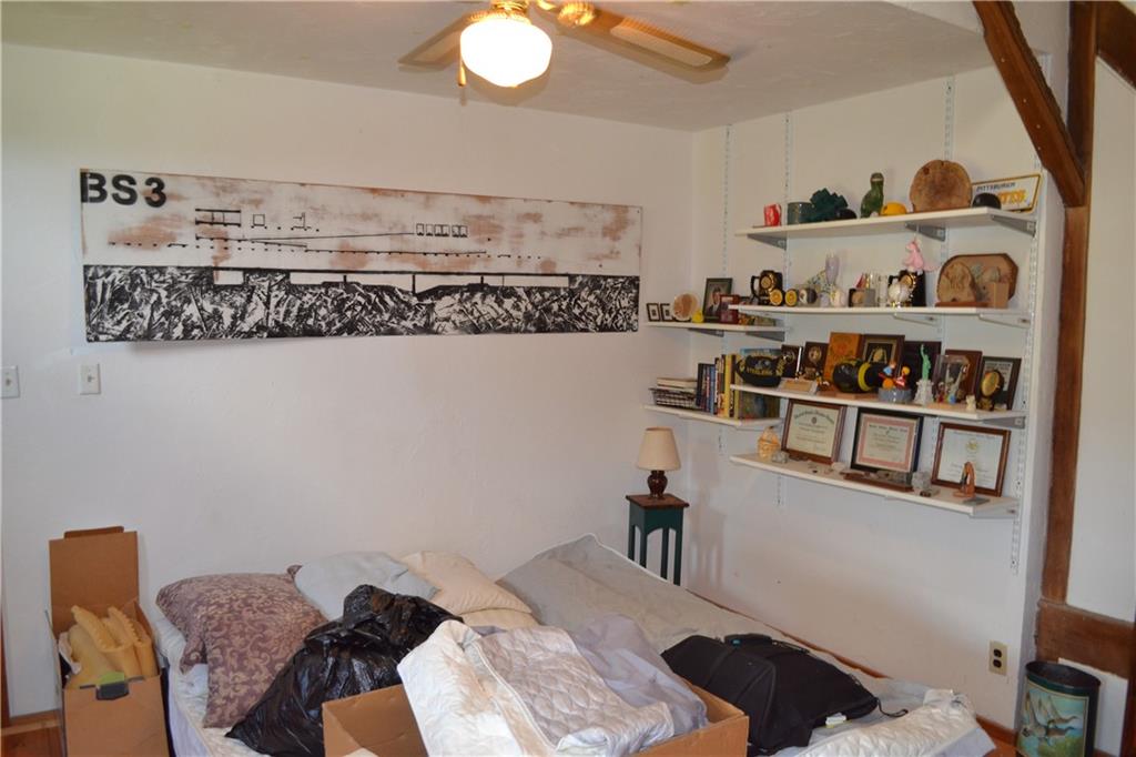 274 Gressly Road Ruffs Dale, PA 15679 - Photo 42 of 49 a bedroom with a bed and closet