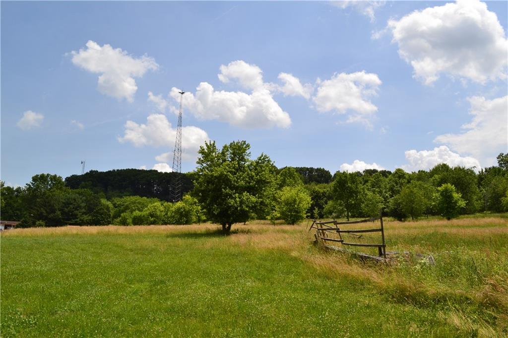 274 Gressly Road Ruffs Dale, PA 15679 - Photo 48 of 49 a view of a golf course with a lake