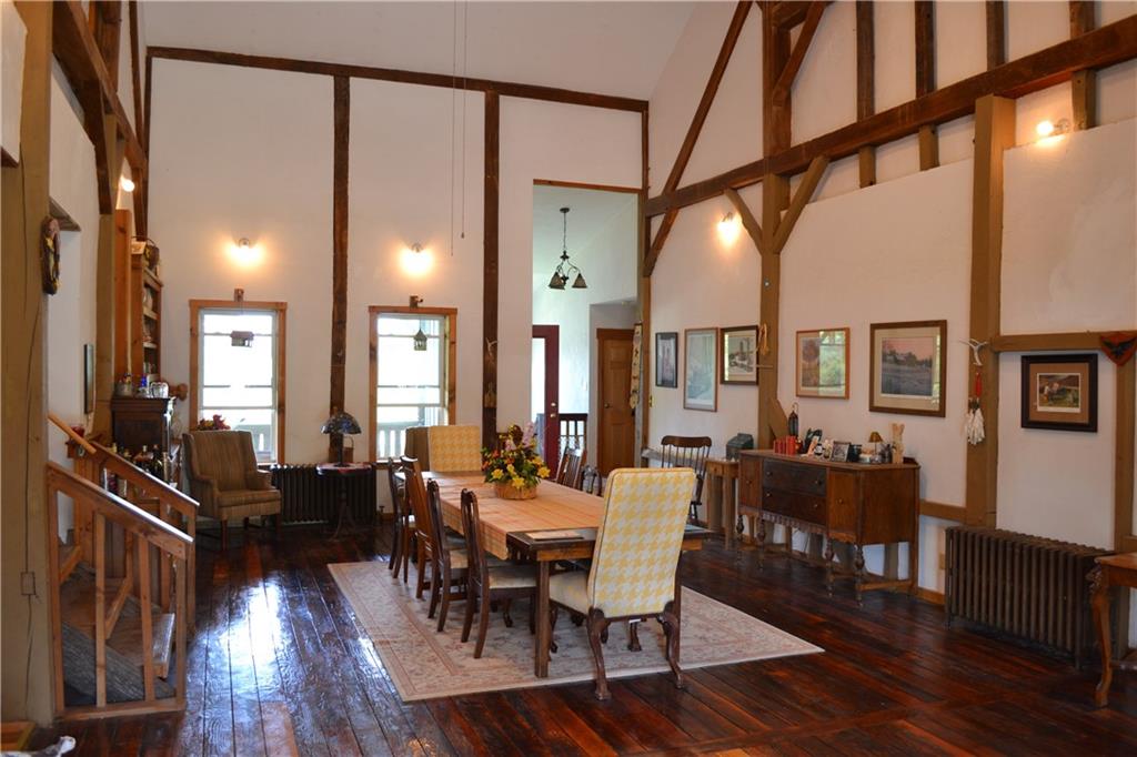 274 Gressly Road Ruffs Dale, PA 15679 - Photo 10 of 49 a view of a dining room with furniture window and wooden floor