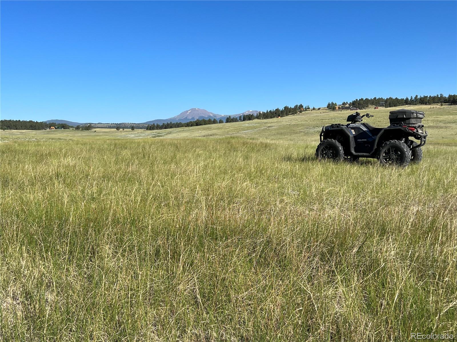 3255 Ranch Road Hartsel, CO 80449 - Photo 17 of 22 a view of a lake and mountain in the back