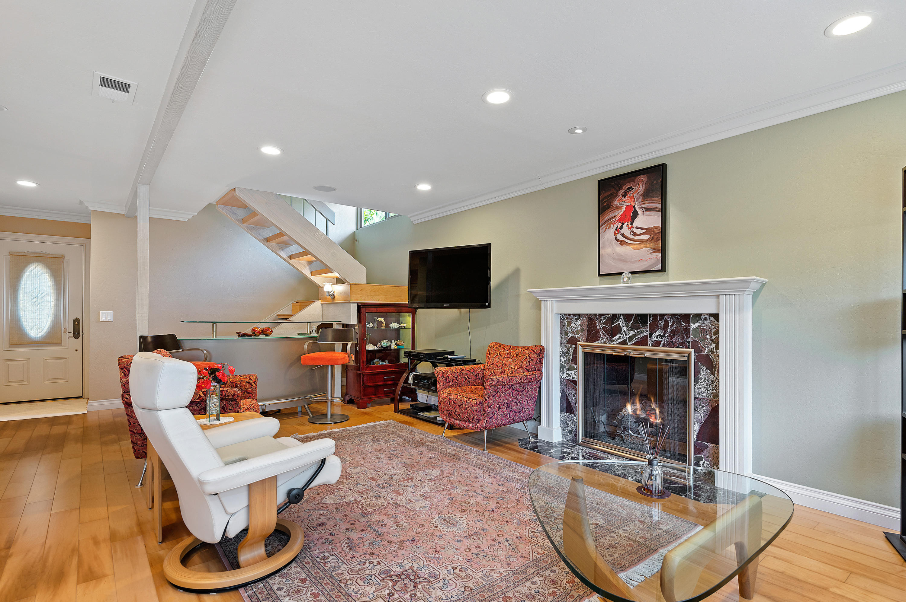 9 North San Marcos Road, Unit B Santa Barbara, CA 93111 - Photo 1 of 16 Spacious living room with gas fireplace