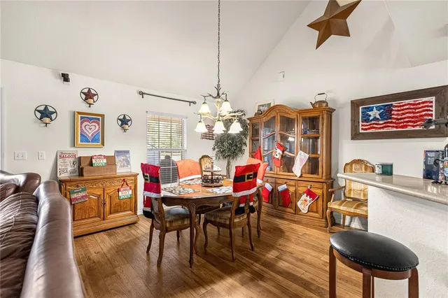 a kitchen with counter top space a sink and appliances