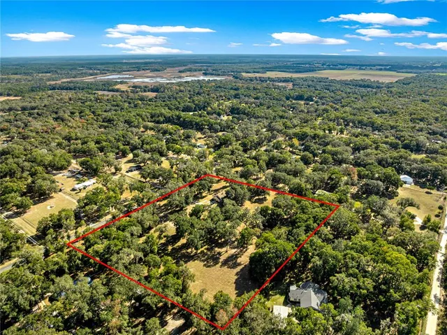 a view of swimming pool with seating space