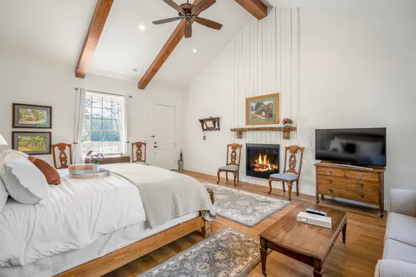 a bedroom with a bed and furniture