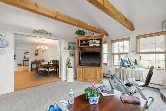 a bathroom with a sink toilet and a mirror
