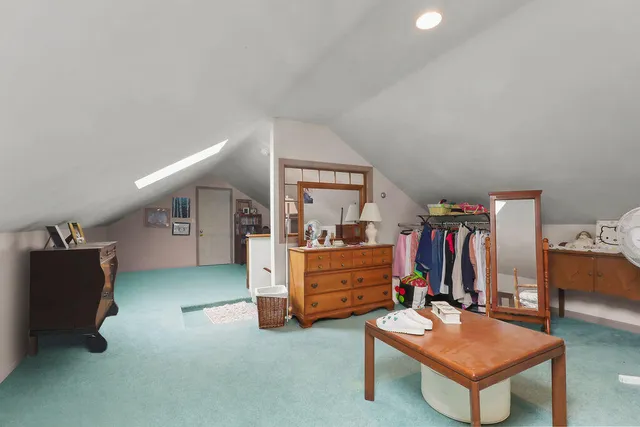 a view of a storage & utility room with two washing machine