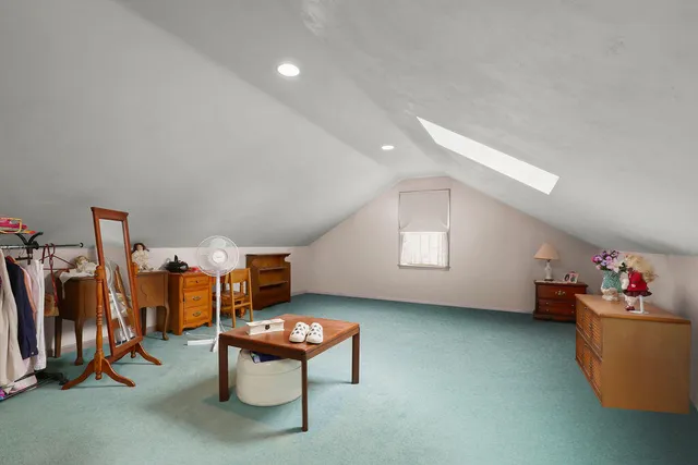 a room with furniture and window