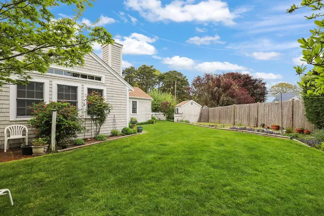 a view of a yard with an outdoor space