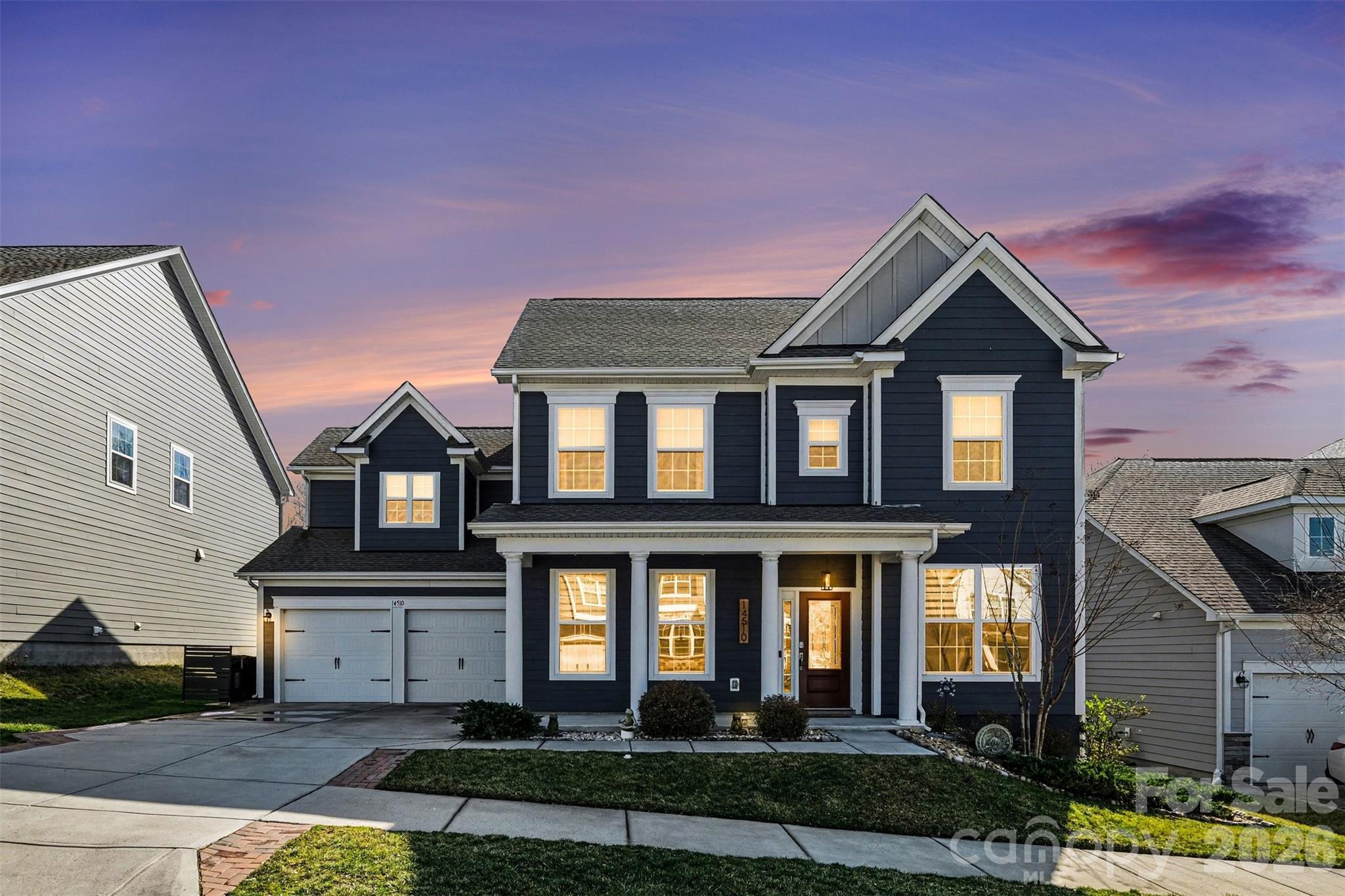14510 Grundys Way Davidson, NC 28036 - Photo 1 of 43 a front view of a house with yard