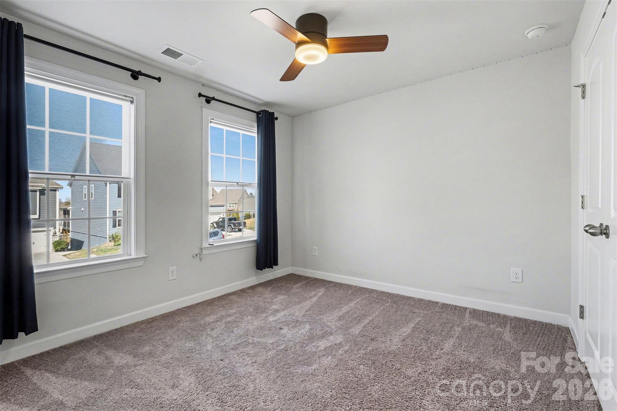 14510 Grundys Way Davidson, NC 28036 - Photo 28 of 43 a view of an empty room with a window