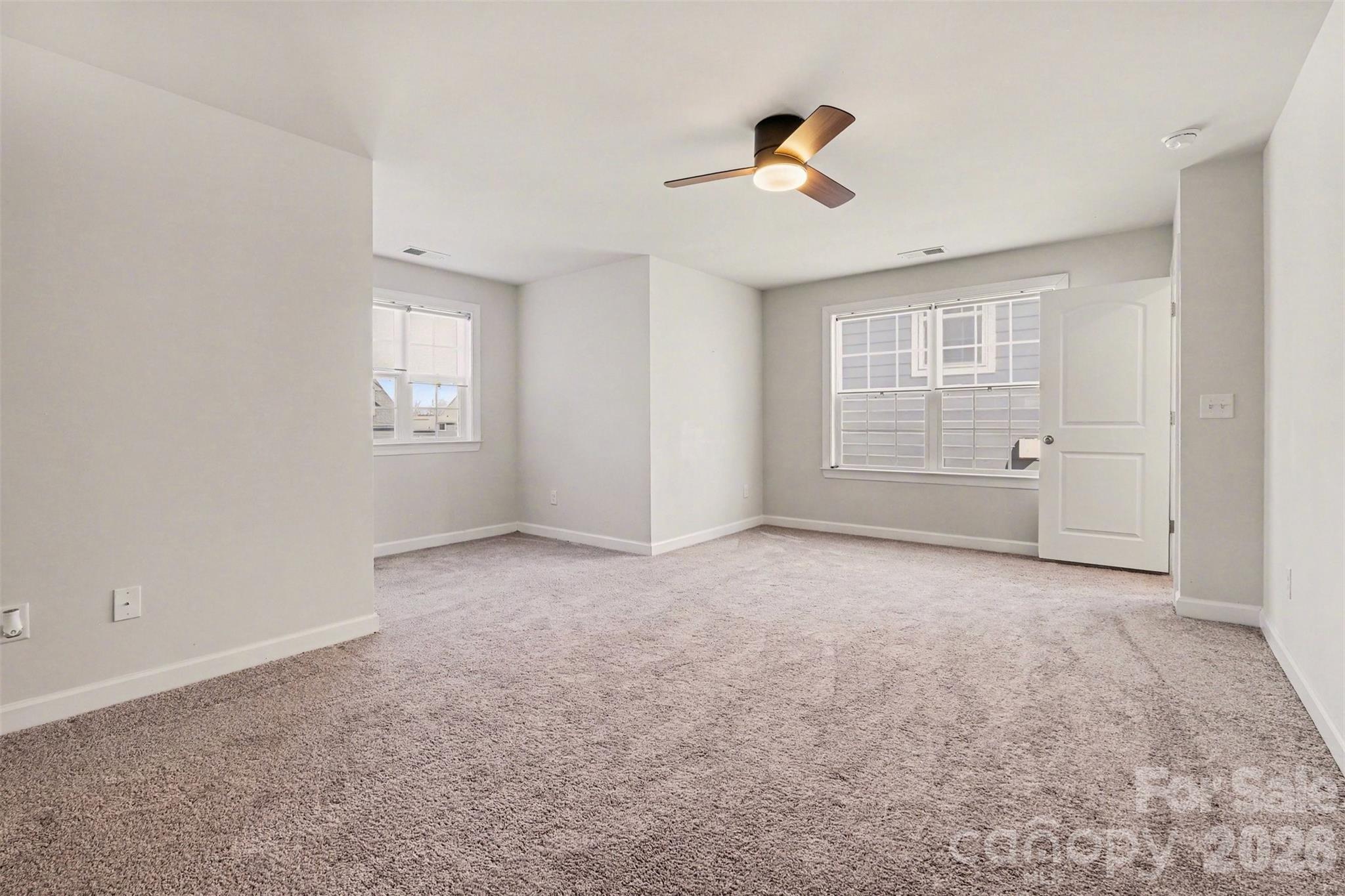 14510 Grundys Way Davidson, NC 28036 - Photo 29 of 43 a view of an empty room with a window