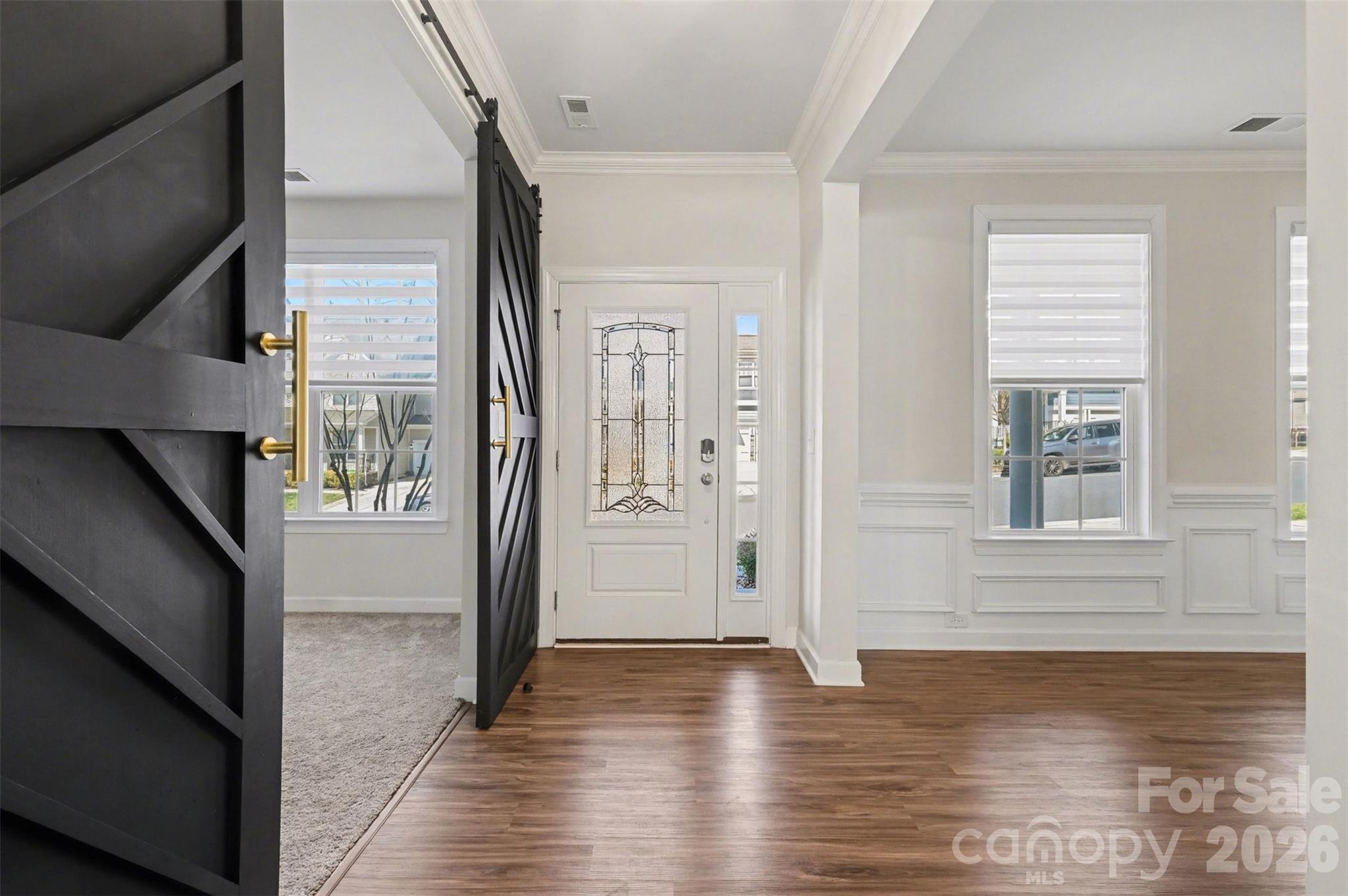 14510 Grundys Way Davidson, NC 28036 - Photo 3 of 43 a view of an entryway with wooden floor and a window