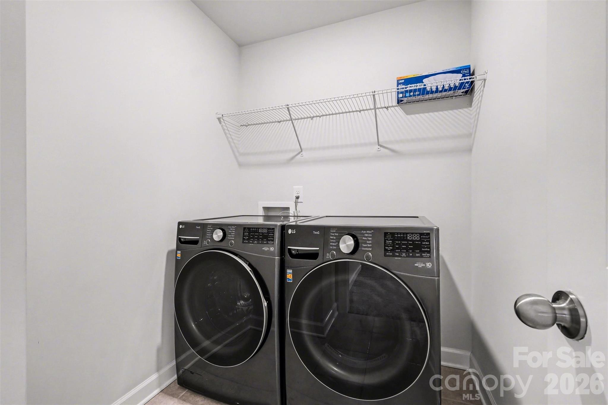 14510 Grundys Way Davidson, NC 28036 - Photo 32 of 43 a utility room with dryer and washer