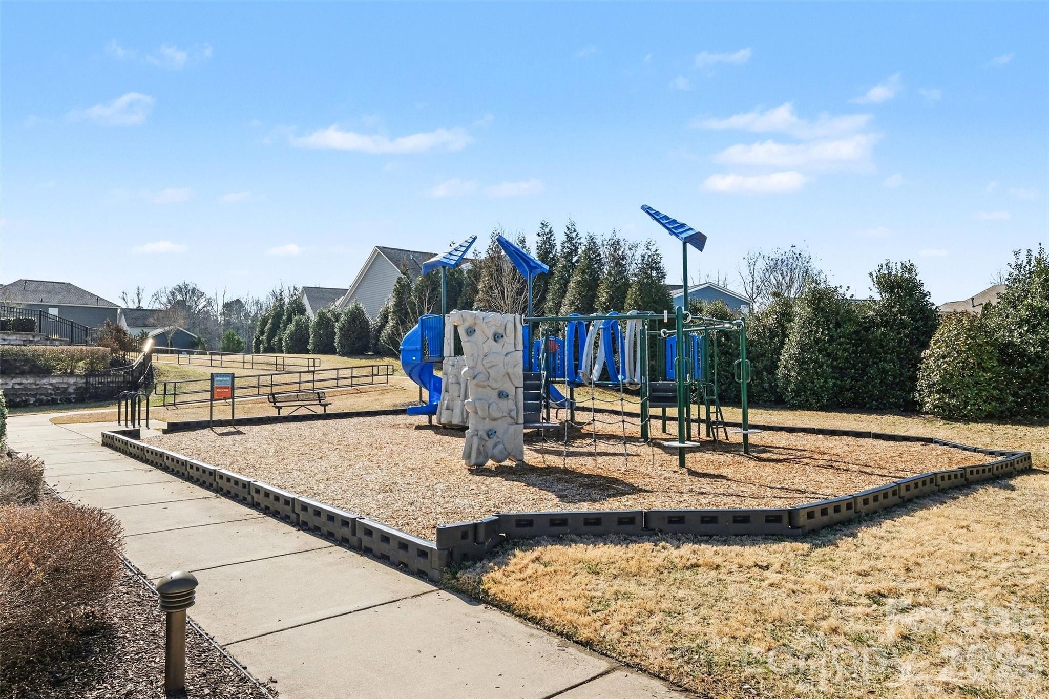 14510 Grundys Way Davidson, NC 28036 - Photo 41 of 43 a view of swimming pool with a sitting area