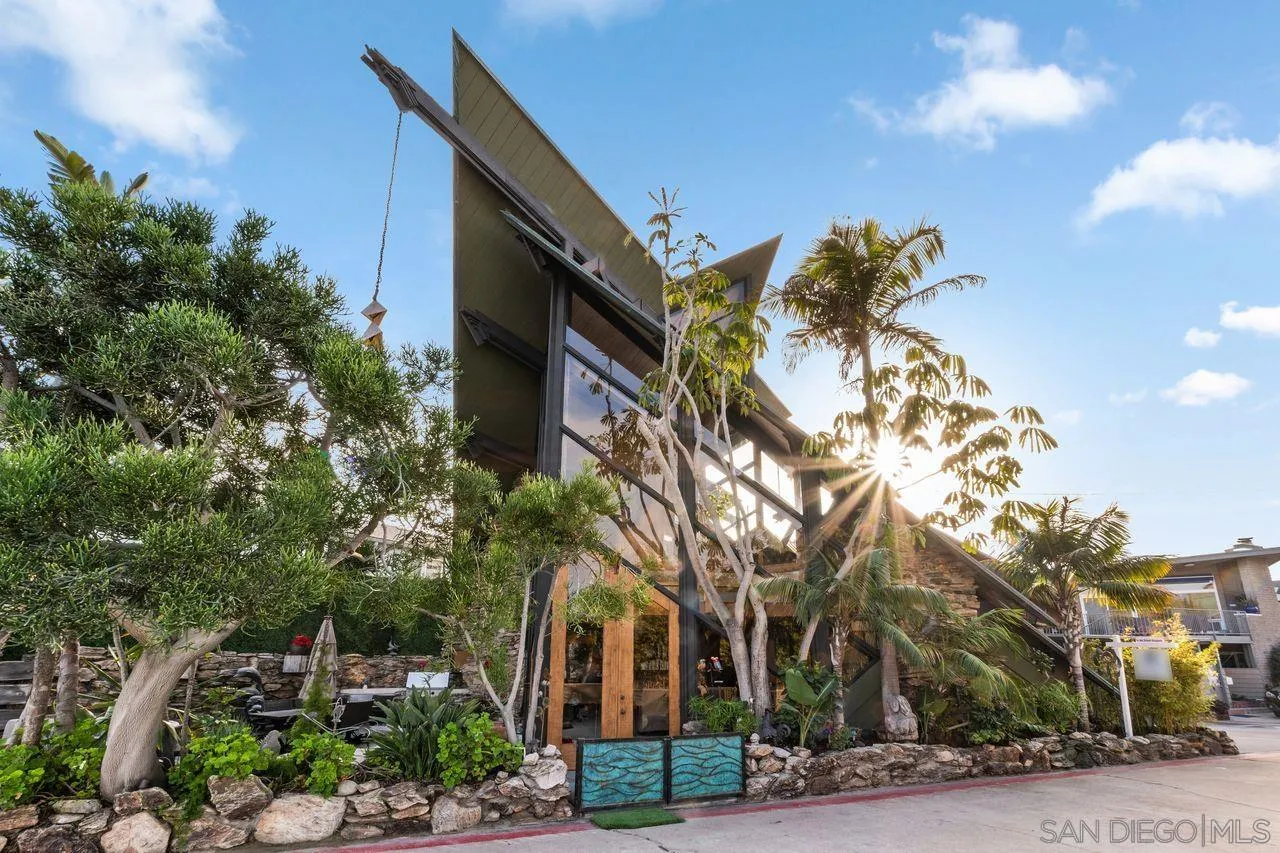 2694 Bayside Walk San Diego, CA 92109 - Photo 16 of 37 a front view of a house with a yard