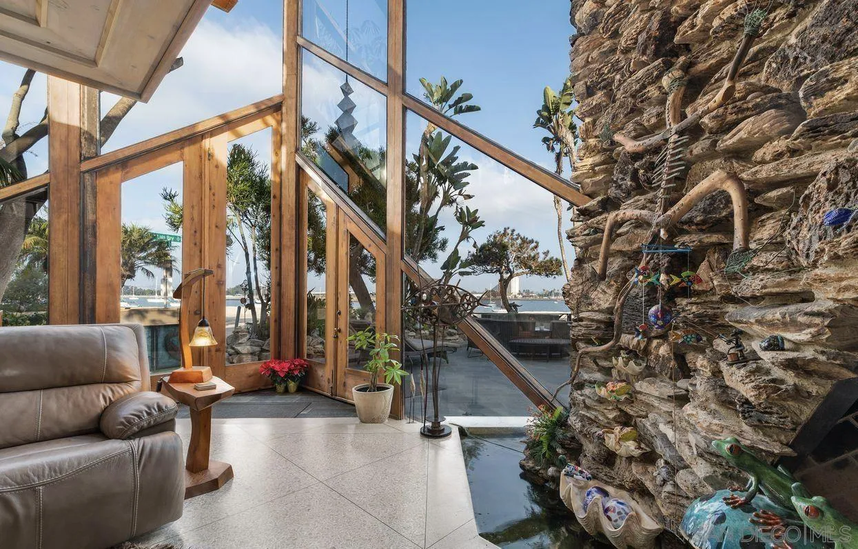 2694 Bayside Walk San Diego, CA 92109 - Photo 2 of 37 a living room with furniture and stairs