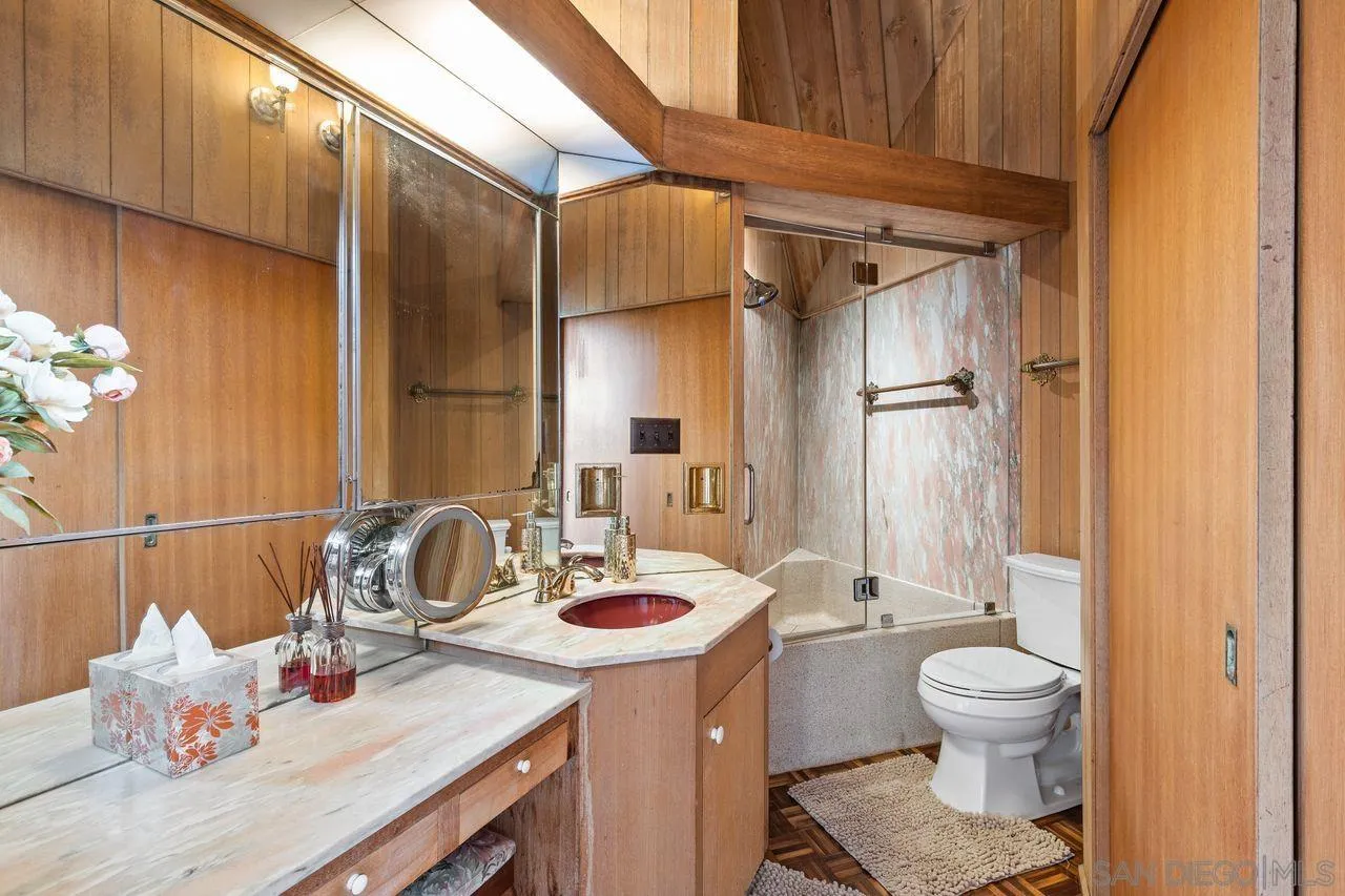 2694 Bayside Walk San Diego, CA 92109 - Photo 29 of 37 a bathroom with a sink toilet and shower