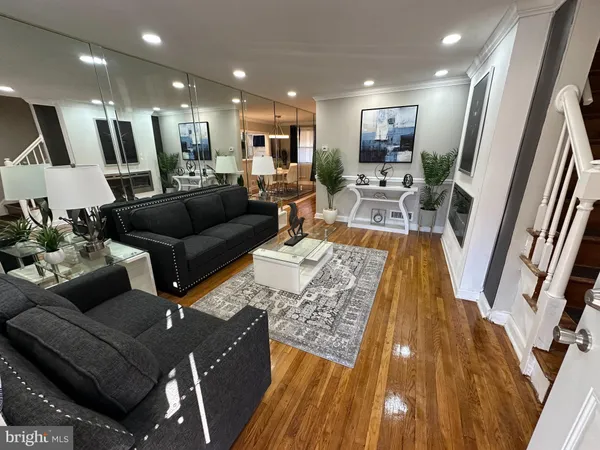 a view of a living room and dining room