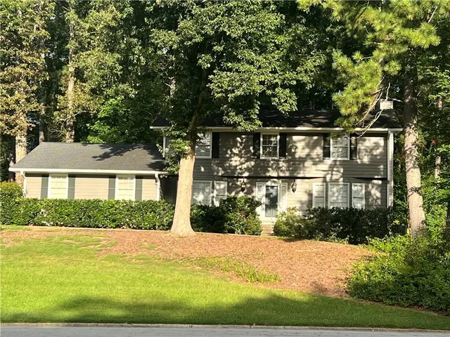 a view of house with outdoor space