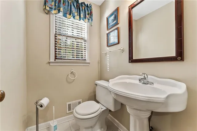 a bathroom with a sink and a toilet