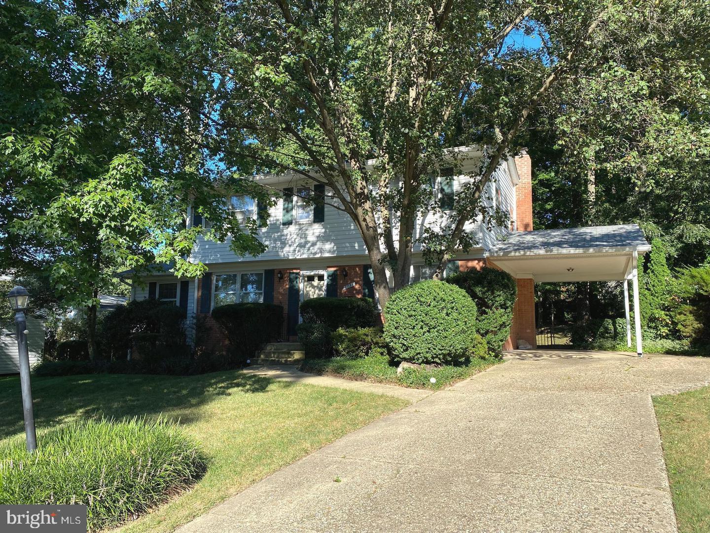 6731 Bellamy Avenue Springfield, VA 22152 - Photo 2 of 19 a view of a house with a yard