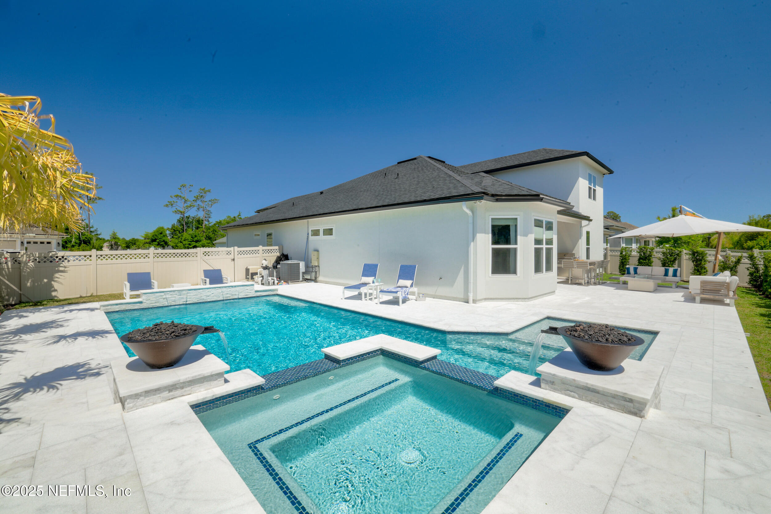 318 Windwalker Drive St. Augustine, FL 32092 - Photo 12 of 54 a front view of a house with garden
