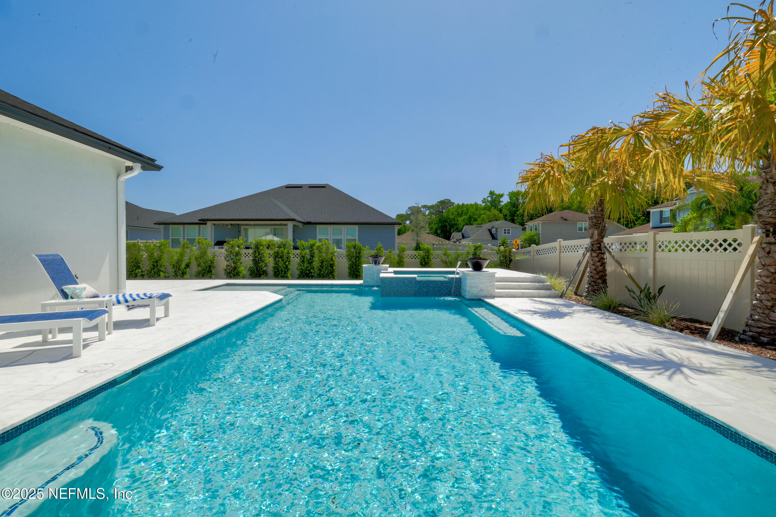318 Windwalker Drive St. Augustine, FL 32092 - Photo 13 of 54 a view of a house with backyard and sitting area