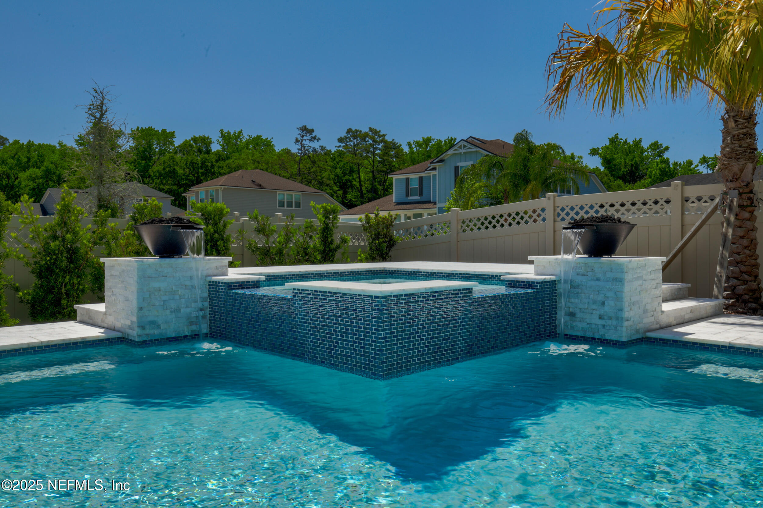 318 Windwalker Drive St. Augustine, FL 32092 - Photo 16 of 54 a view of a house with a yard and sitting area