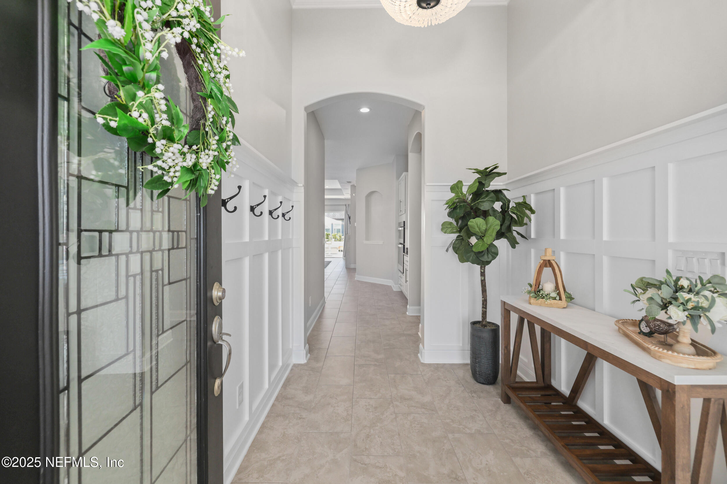 318 Windwalker Drive St. Augustine, FL 32092 - Photo 24 of 54 a view of a hallway to a potted plant