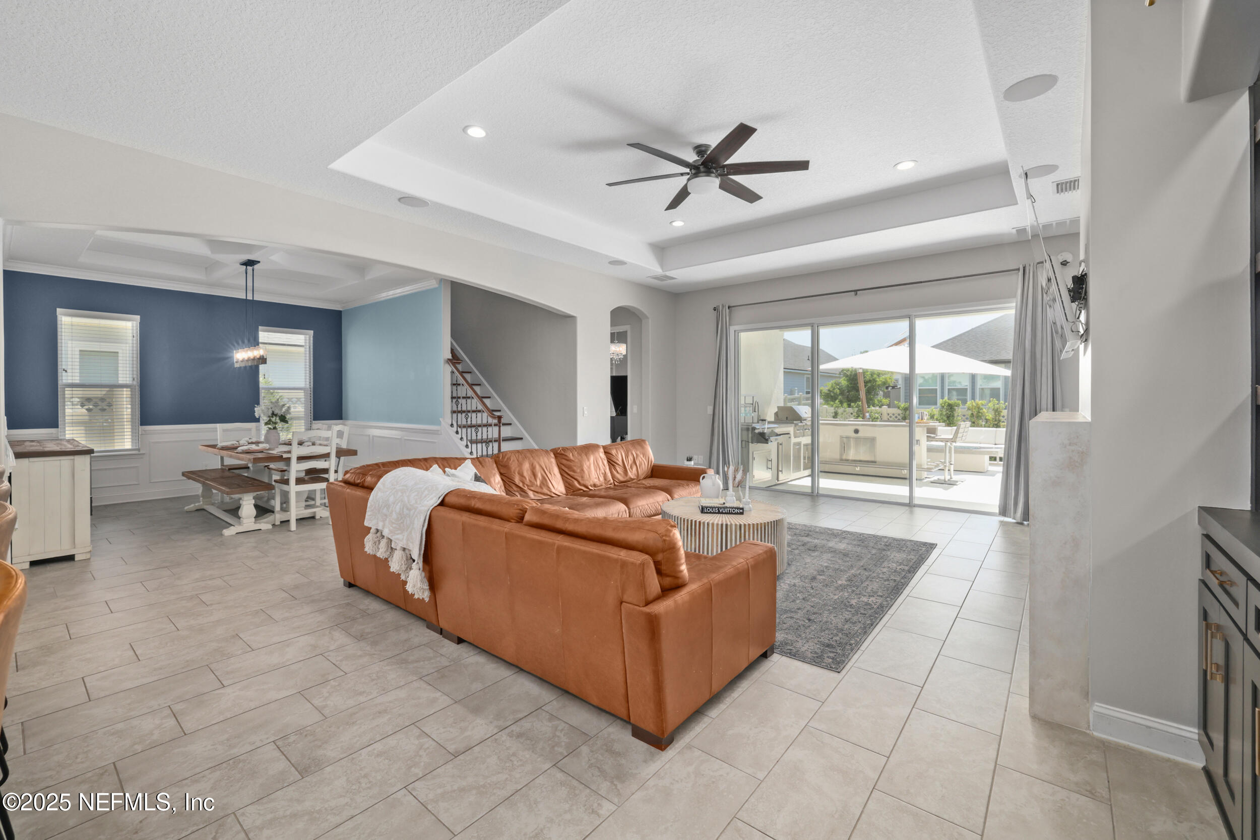 318 Windwalker Drive St. Augustine, FL 32092 - Photo 35 of 54 a living room with furniture and a large window
