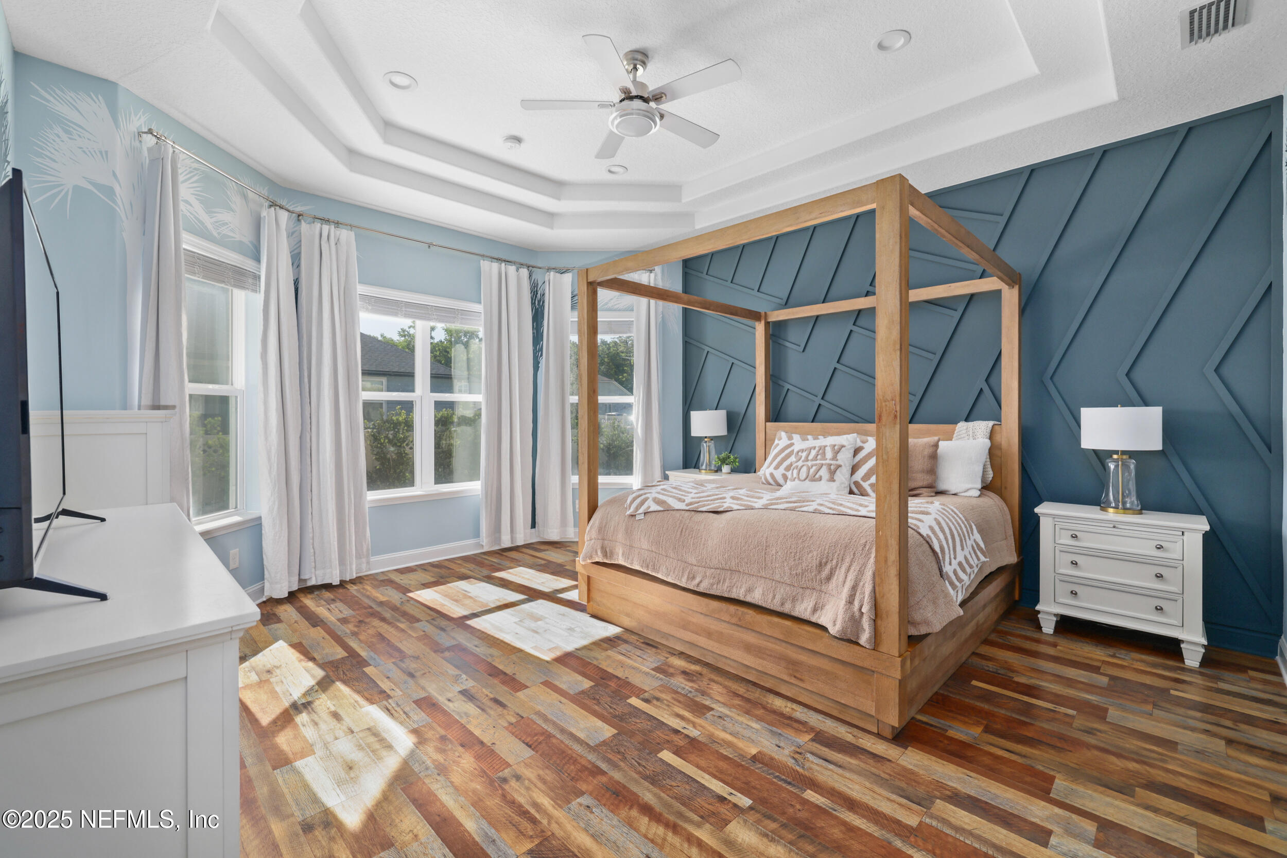 318 Windwalker Drive St. Augustine, FL 32092 - Photo 37 of 54 a bedroom with a large bed and a window