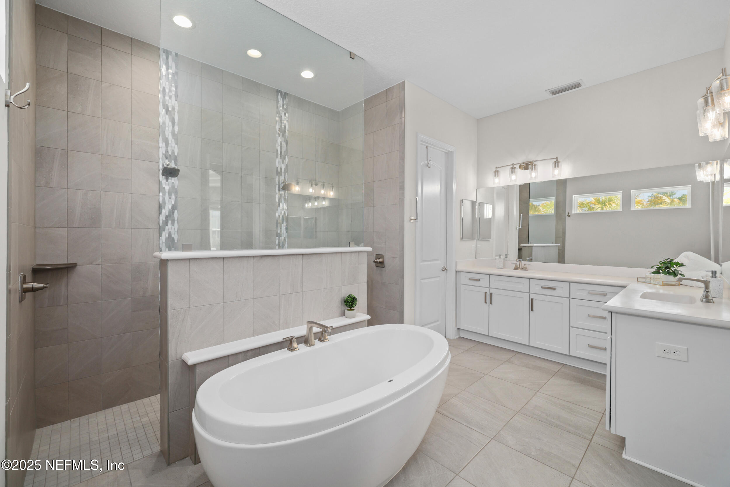 318 Windwalker Drive St. Augustine, FL 32092 - Photo 40 of 54 Standalone tub and dual vanities